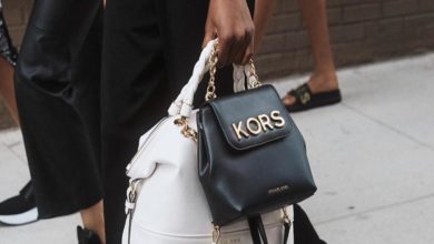 Michael Kors complete purchase of Versace